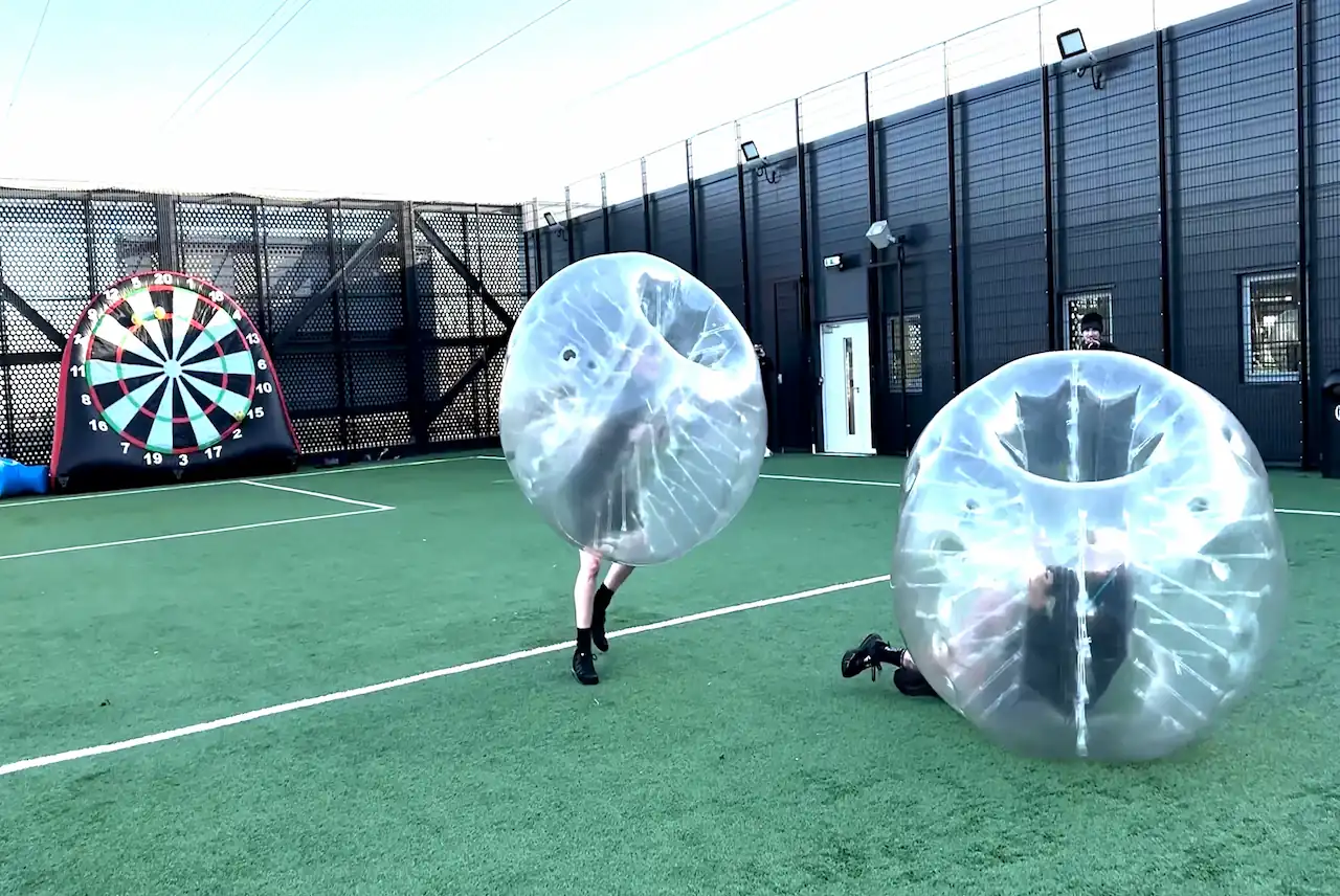 Group playing bubble football